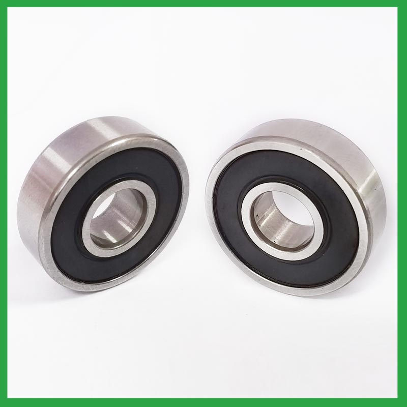 How do sealed ball bearings prevent the ingress of contaminants and extend the bearing's service life?