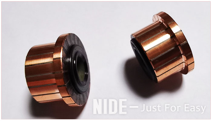 Automotive fan motor slot commutator