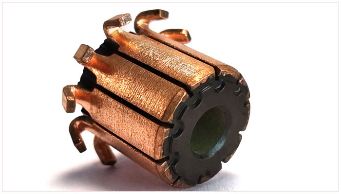 Automotive seat motor commutator